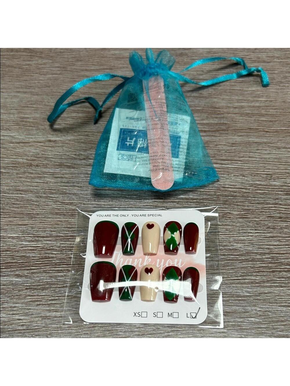 Elegant Handmade Nail Art Set with Red and Green Argyle Accents